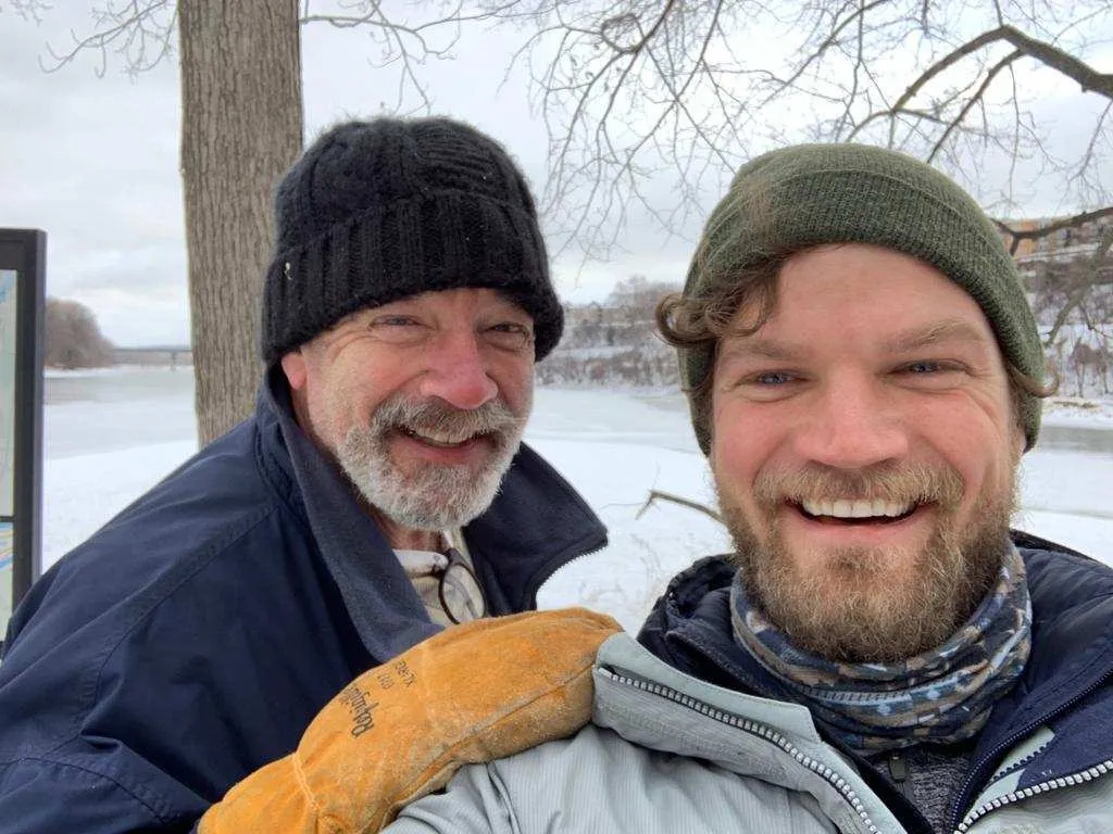 Tom and Kevin Doran outdoors during a cross-country skiing outing